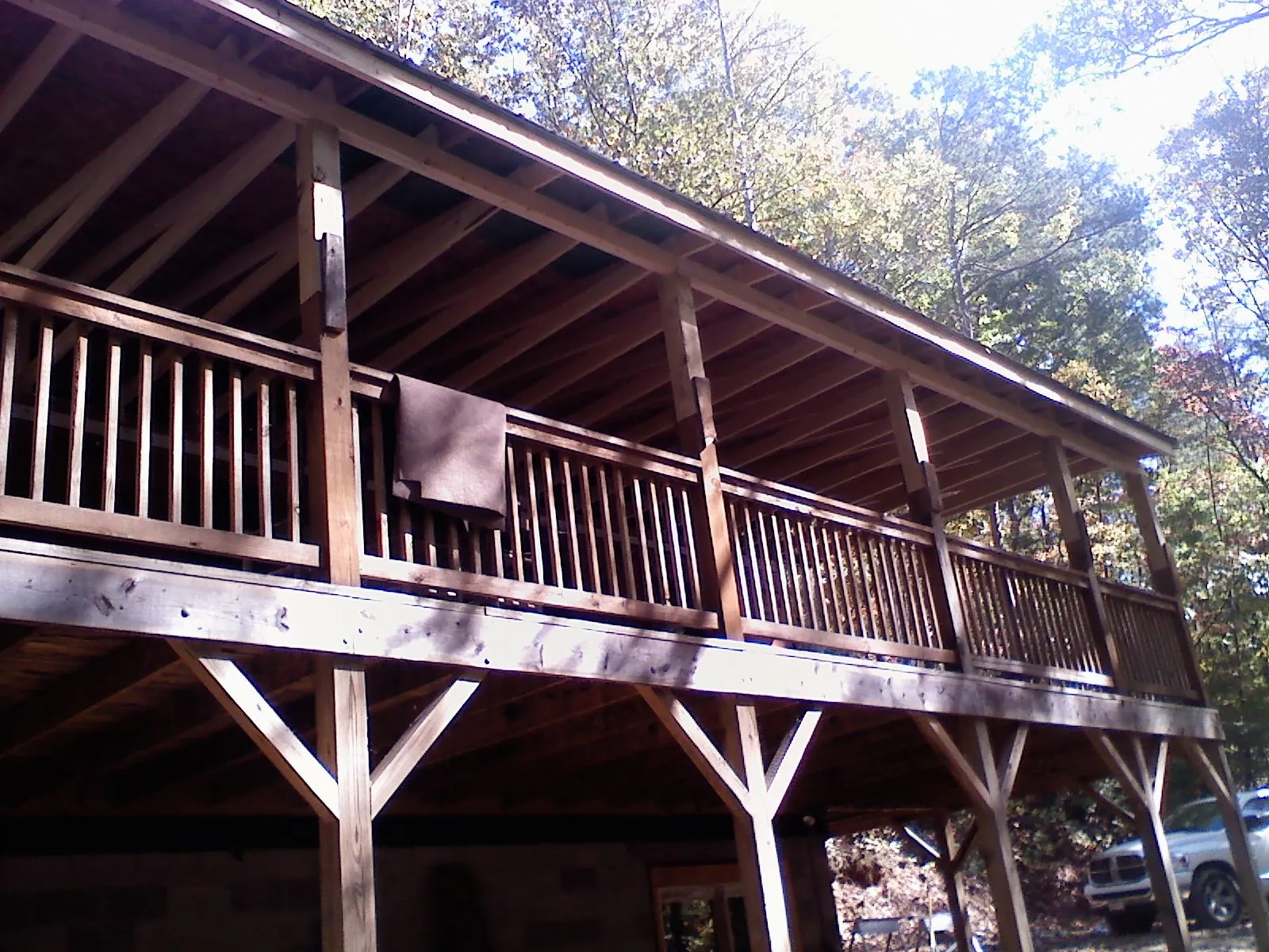 Timber framing under a new elevated porch and deck — Roof Leak Repair in Hinsdale by Roofing Brothers
